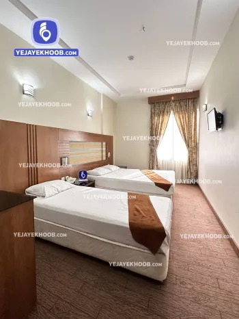 هتل همراز مشهد - اتاق ۳ تخته (۱ تخت ۲ نفره و ۱ تخت ۱ نفره)    