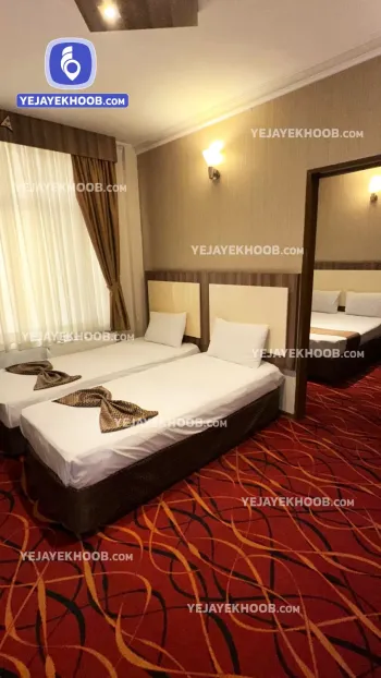 هتل پرستاره مشهد - اتاق ۴ تخته ( یک تخت دبل + دو تخت سینگل )