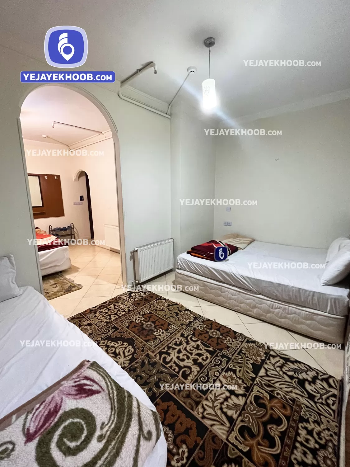 هتل آپارتمان بهاران مشهد - اتاق ۴ تخته (۱ تخت ۲ نفره و ۲ تخت ۱ نفره)  