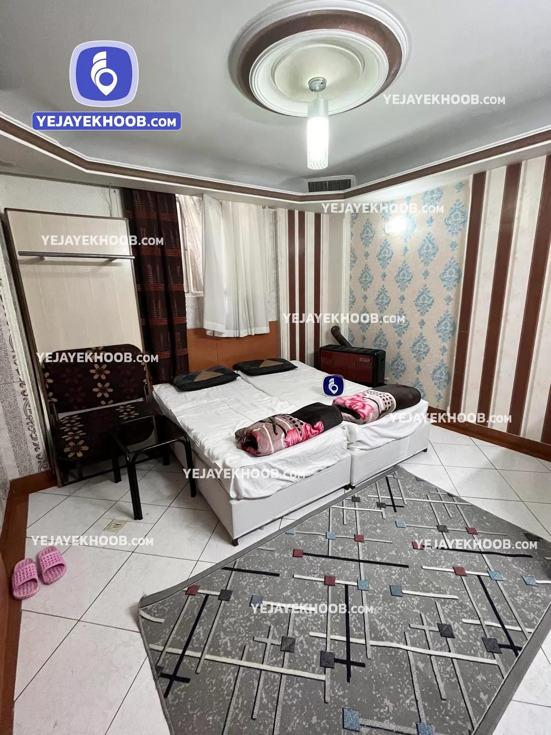 هتل آپارتمان گردشگران مشهد - اتاق ۲ تخته (۲ تخت ۱ نفره) همراه با کاناپه تختخوابشو