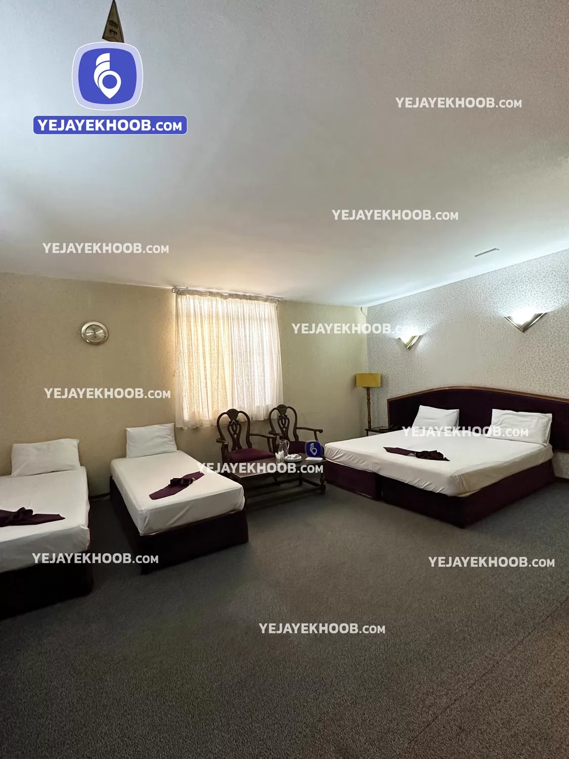 هتل شیراز مشهد - اتاق ۴ تخته (۱ تخت ۲ نفره و ۲ تخت ۱ نفره)  