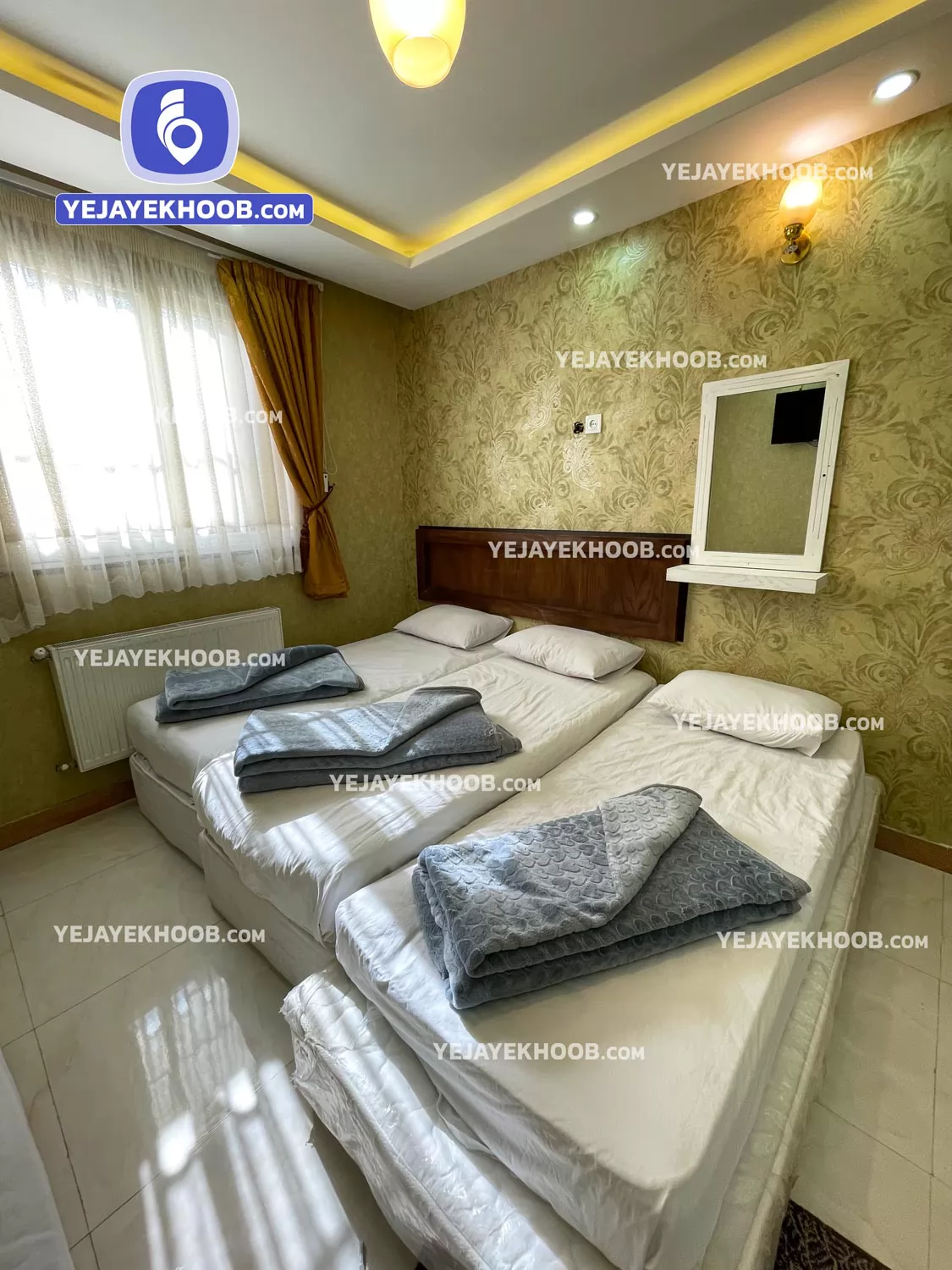 هتل عشاق الرضا (ع) مشهد - اتاق ۳ تخته (۳ تخت ۱ نفره)    
